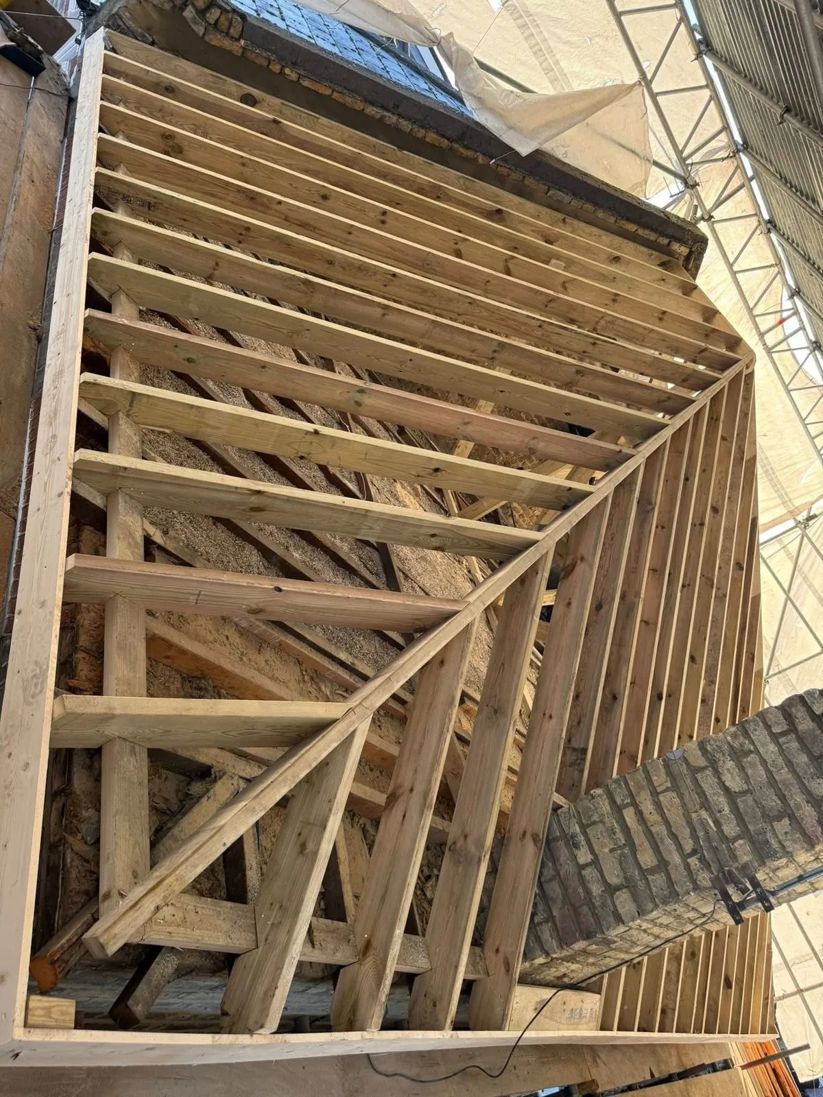 New roof timbers and rafters during a re-roof in Launceston